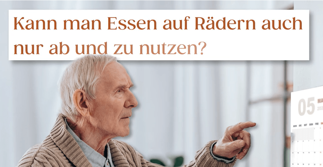 Älterer Herr, der auf seinen Wandkalender schaut